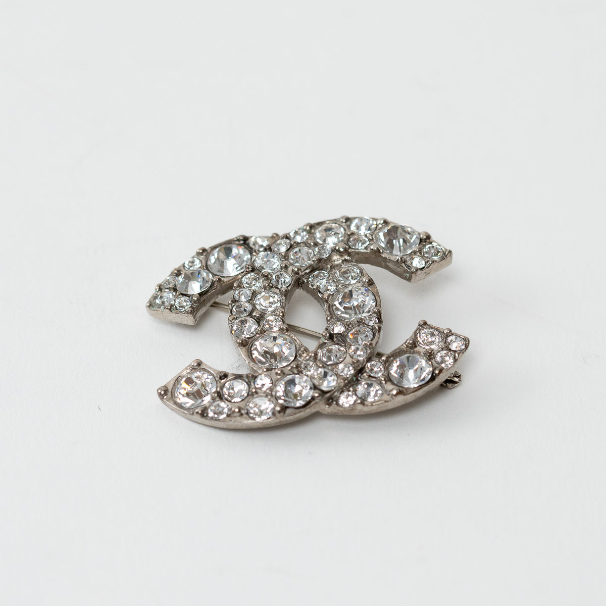 Pre-Loved Chanel™ Silver Tone Crystal Embellished Brooch