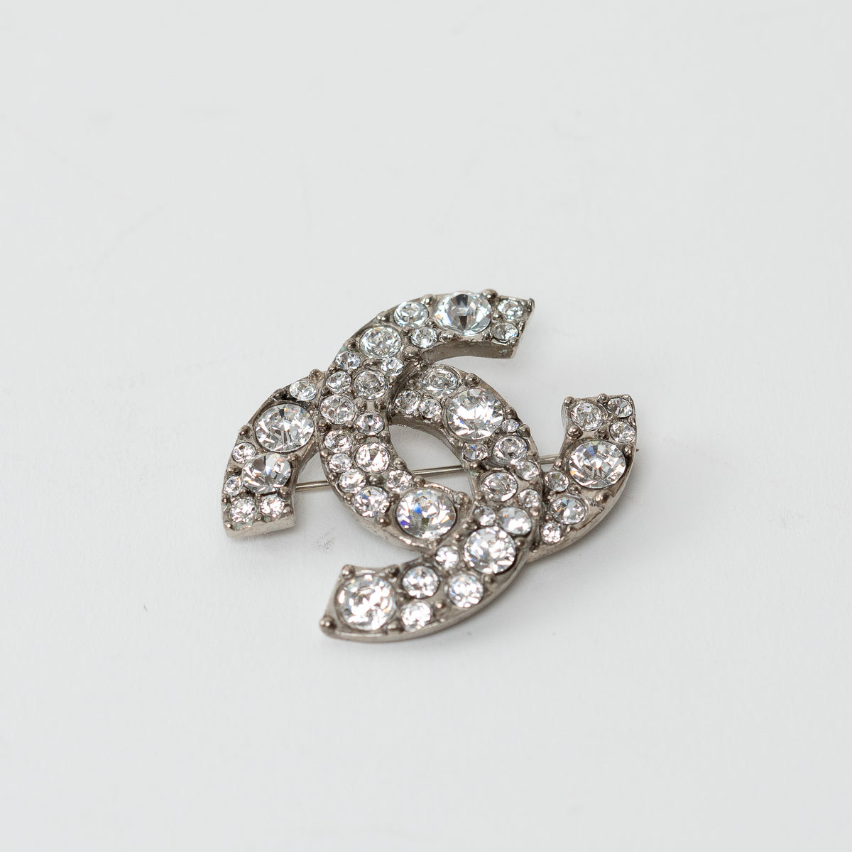 Pre-Loved Chanel™ Silver Tone Crystal Embellished Brooch