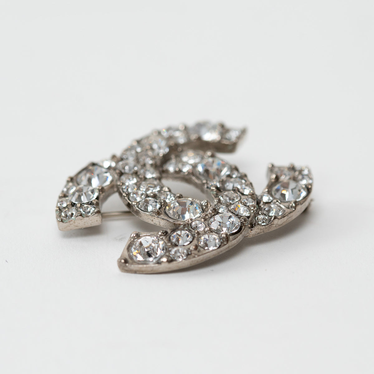 Pre-Loved Chanel™ Silver Tone Crystal Embellished Brooch
