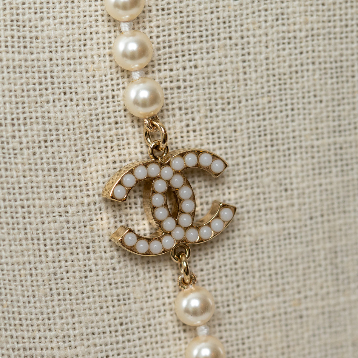 Pre-Loved Chanel™ Faux Pearl Necklace with Gold Tone Logo Links Embellished with Pearls