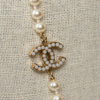 Pre-Loved Chanel™ Faux Pearl Necklace with Gold Tone Logo Links Embellished with Pearls