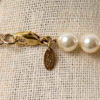 Pre-Loved Chanel™ Faux Pearl Necklace with Gold Tone Logo Links Embellished with Pearls