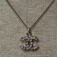 Pre-Loved Chanel™ Silver Crystal Embellished Logo Necklace