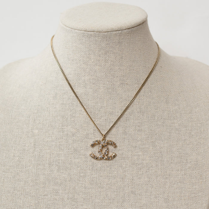 Pre-Loved Chanel™ Gold Two Tone Crystal Embellished Pendant Logo Necklace