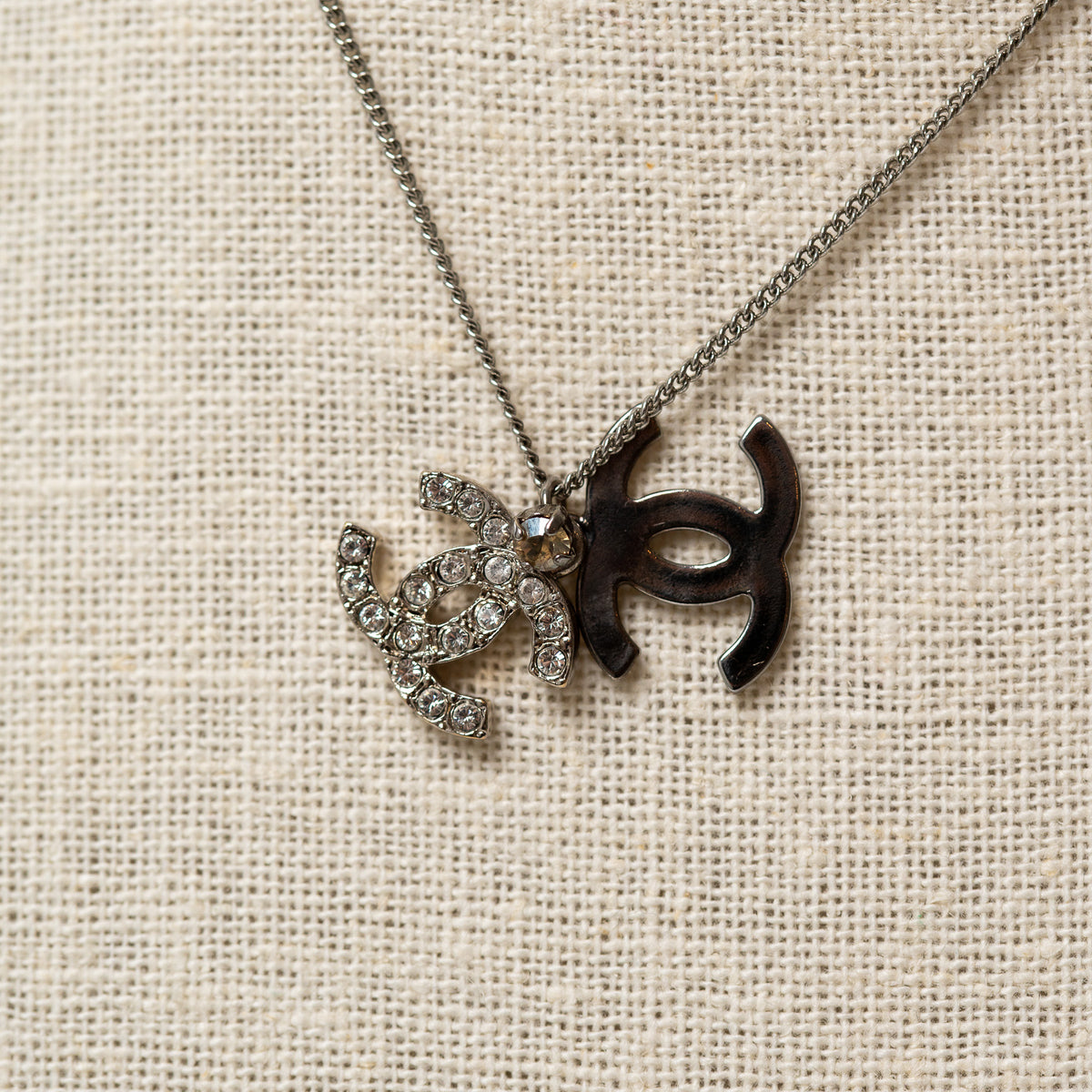 Pre-Loved Chanel™ Silver Tone Necklace with Double Interlocking Logo Pendant