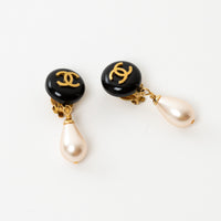 Chanel pearl drop clip on earrings with black enamel and gold CC logo