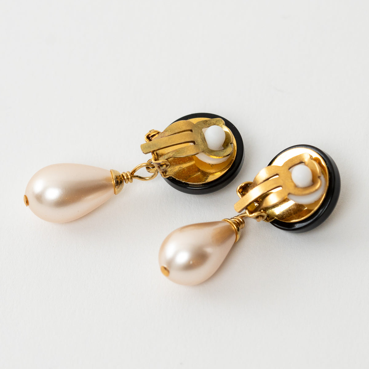 Pre-Loved Chanel™ Gold Logo Black Enamel Faux Pearl Drop Clip on Earrings