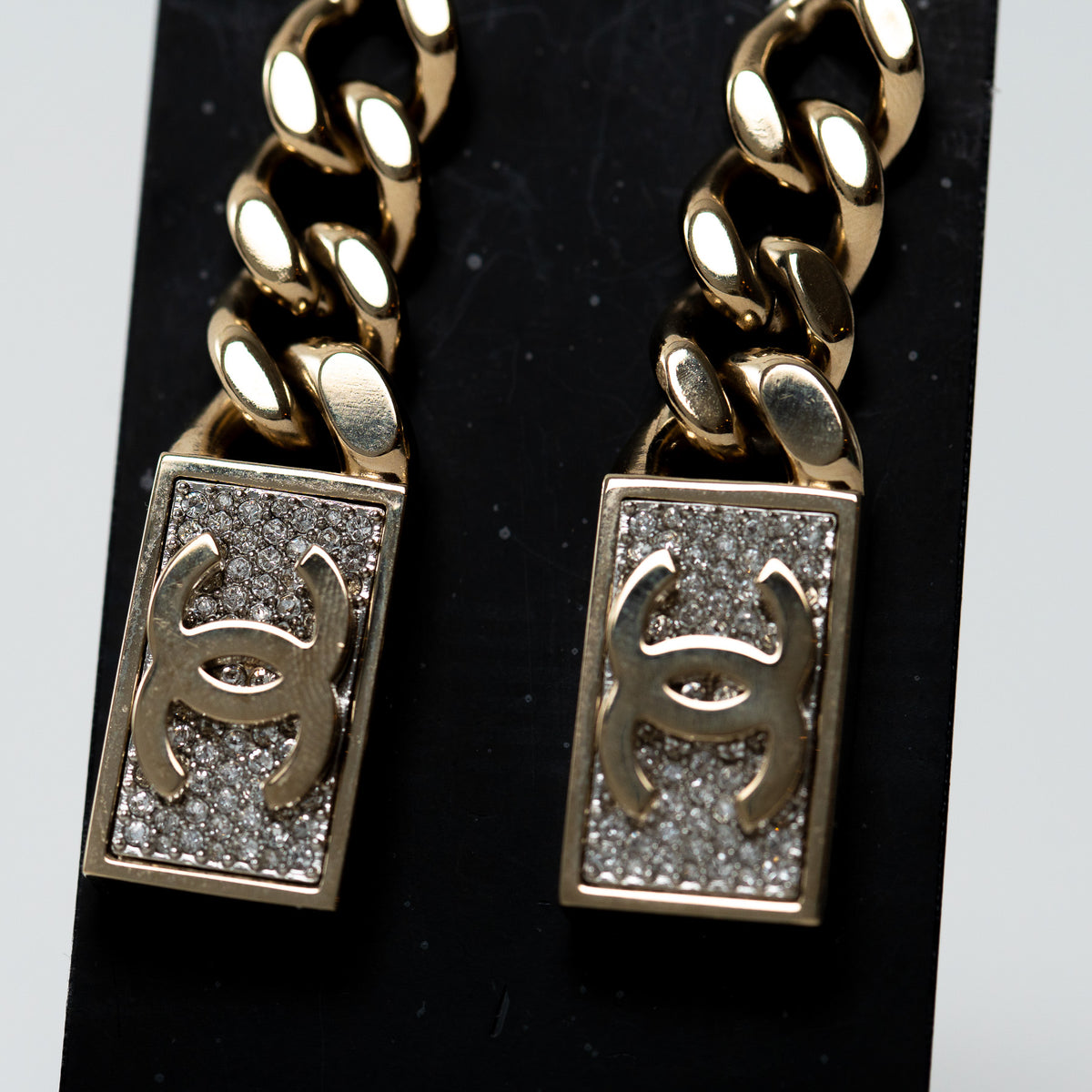 Pre-Loved Chanel™ Gold Tone Chain Crystal Embellished Logo Charm Earring