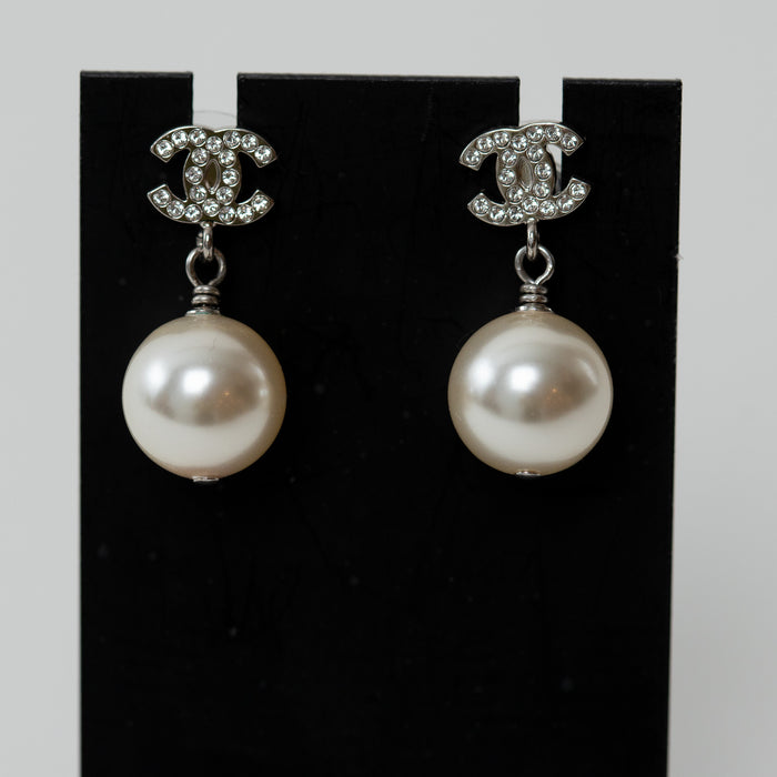 Pre-Loved Chanel™ Silver Tone Mini Crystal Embellished Logo Faux Pearl Drop Earrings
