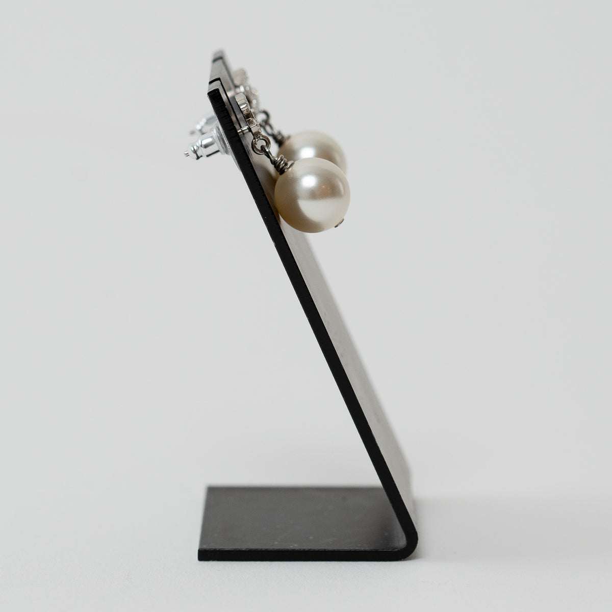 Pre-Loved Chanel™ Silver Tone Mini Crystal Embellished Logo Faux Pearl Drop Earrings