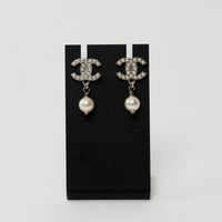 Pre-Loved Chanel™ Silver Tone Faux Pearl Inlaid Logo Pearl Drop Earrings