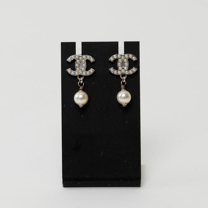 Pre-Loved Chanel™ Silver Tone Faux Pearl Inlaid Logo Pearl Drop Earrings
