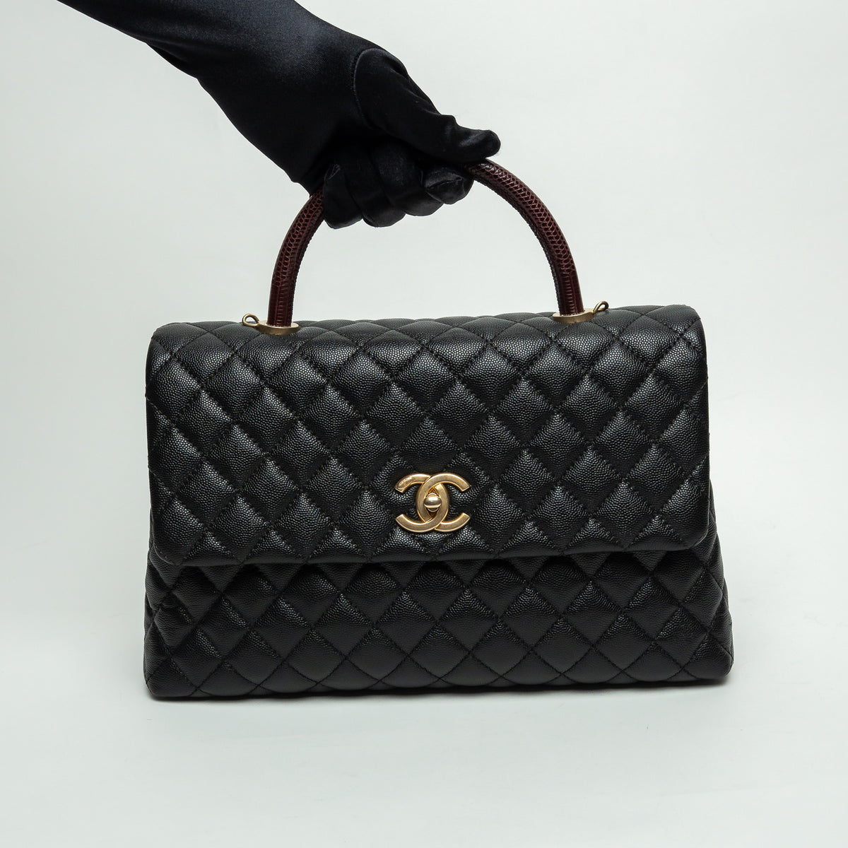Pre-Loved Chanel™ Black Pebbled Leather Medium Coco Handle Bag with Burgundy Lizard Leather Handle