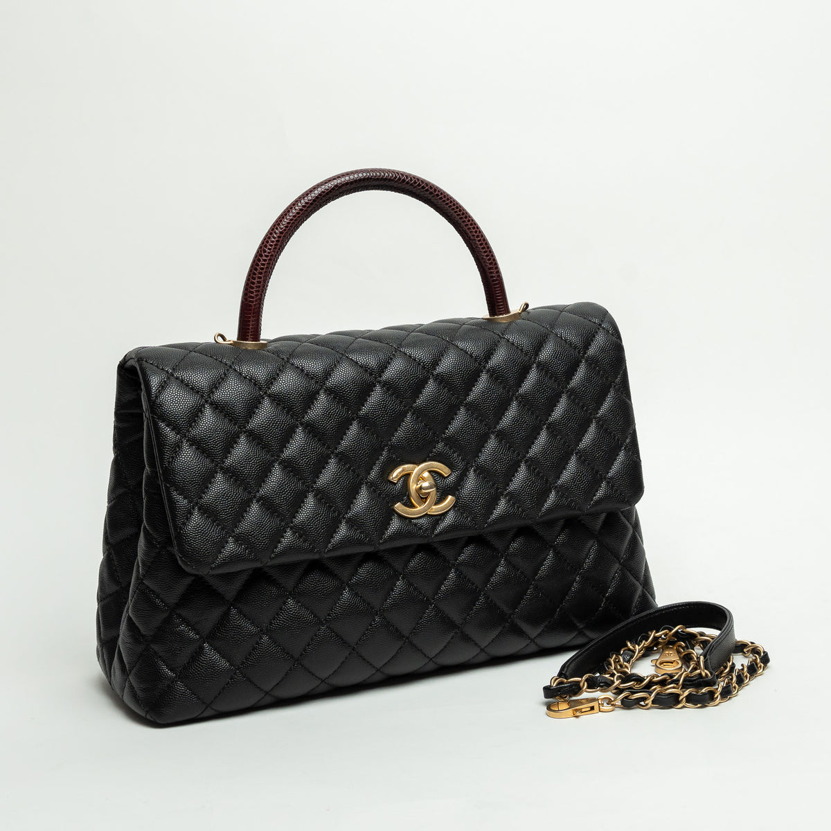 Pre-Loved Chanel™ Black Pebbled Leather Medium Coco Handle Bag with Burgundy Lizard Leather Handle