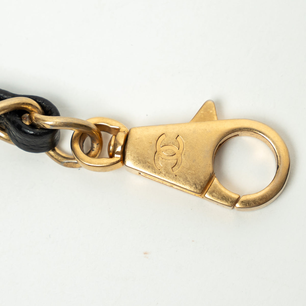 Pre-Loved Chanel™ Black Pebbled Leather Medium Coco Handle Bag with Burgundy Lizard Leather Handle