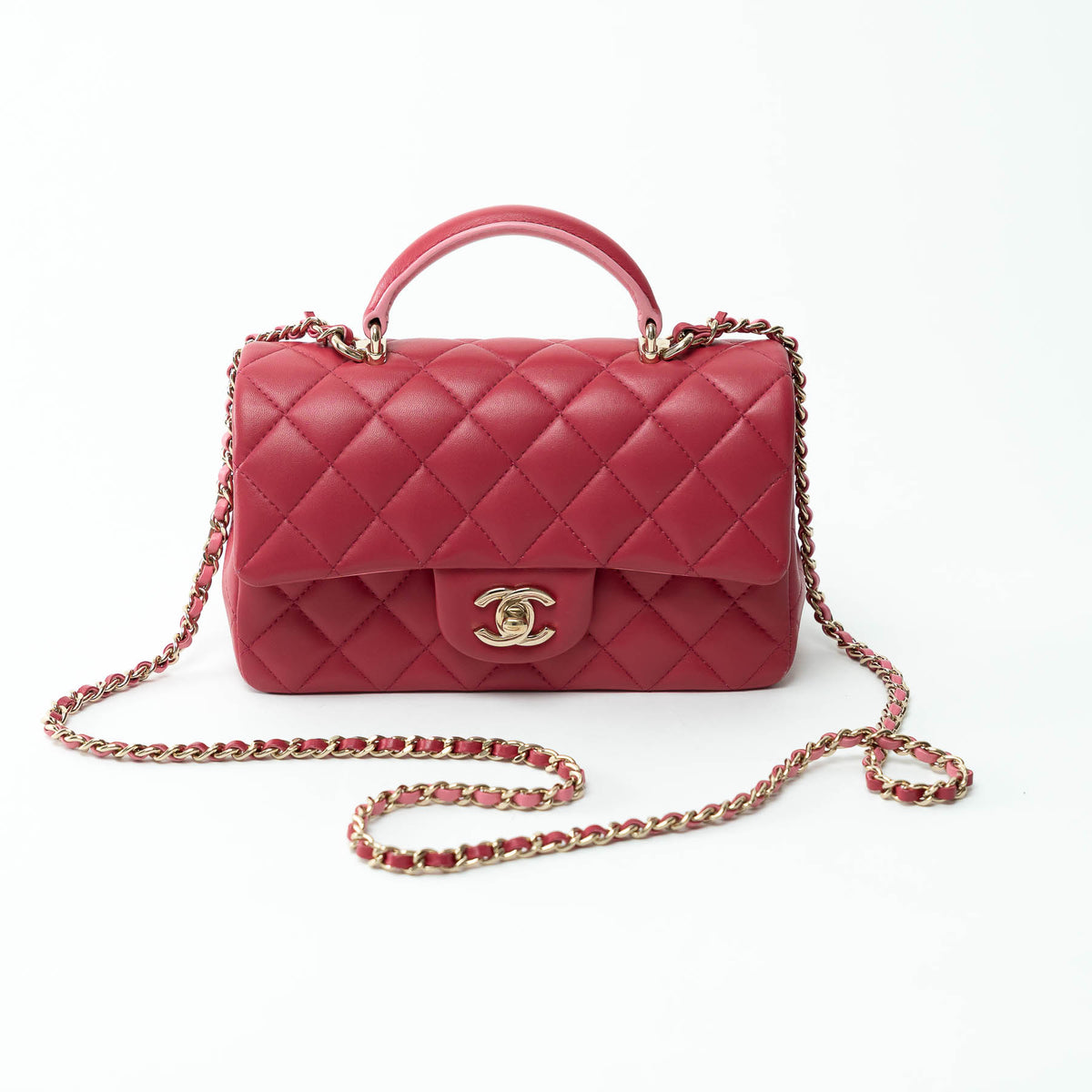 Pre-Loved Chanel™ Pink Raspberry Lambskin Leather Mini Top Handle Bag