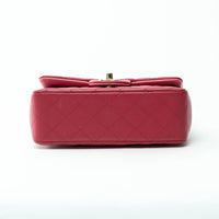 Pre-Loved Chanel™ Pink Raspberry Lambskin Leather Mini Top Handle Bag