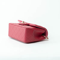 Pre-Loved Chanel™ Pink Raspberry Lambskin Leather Mini Top Handle Bag