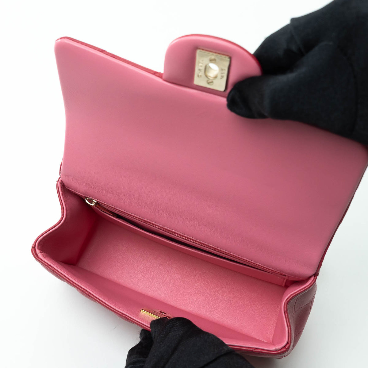 Pre-Loved Chanel™ Pink Raspberry Lambskin Leather Mini Top Handle Bag