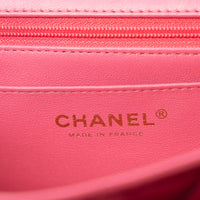 Pre-Loved Chanel™ Pink Raspberry Lambskin Leather Mini Top Handle Bag