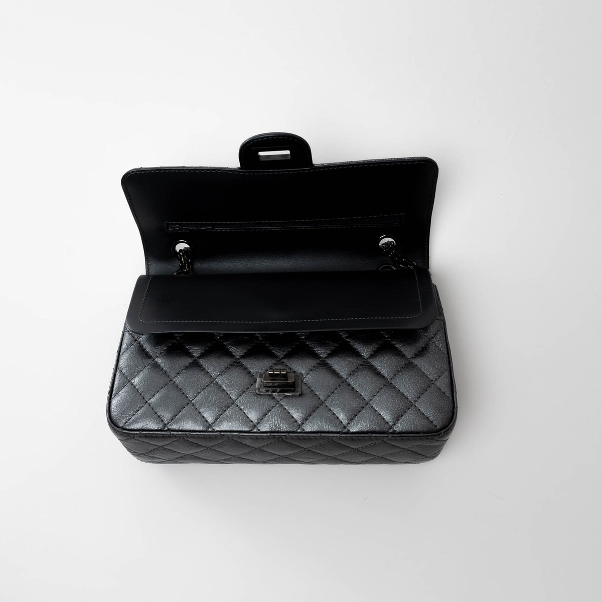 Pre-Loved Chanel ™ Metallic Grained Leather Medium 2.55 Flap Bag