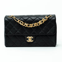 Pre-Loved Chanel™ Black Calfskin Leather Medium Flap Bag with Letter Chain