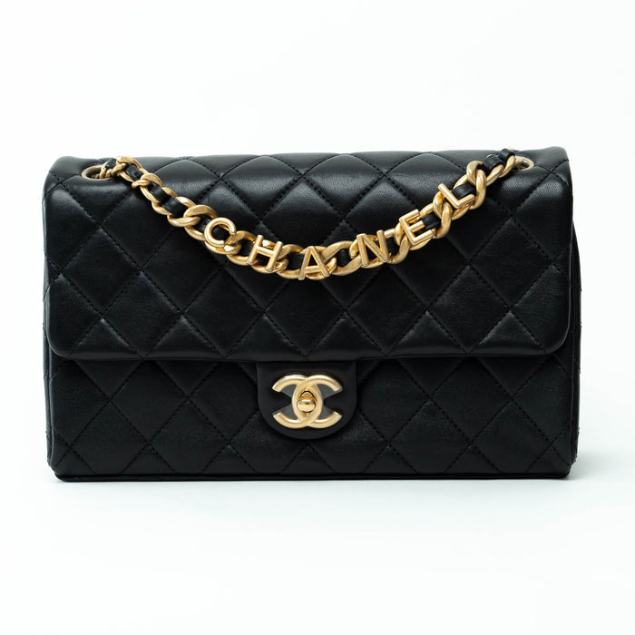 Pre-Loved Chanel™ Black Calfskin Leather Medium Flap Bag with Letter Chain