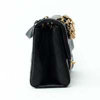 Pre-Loved Chanel™ Black Calfskin Leather Medium Flap Bag with Letter Chain