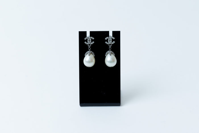 silver tone logo earrings with tear drop pearls (front)