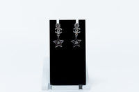silver tone star drop earrings with crystal embellished logo (front)