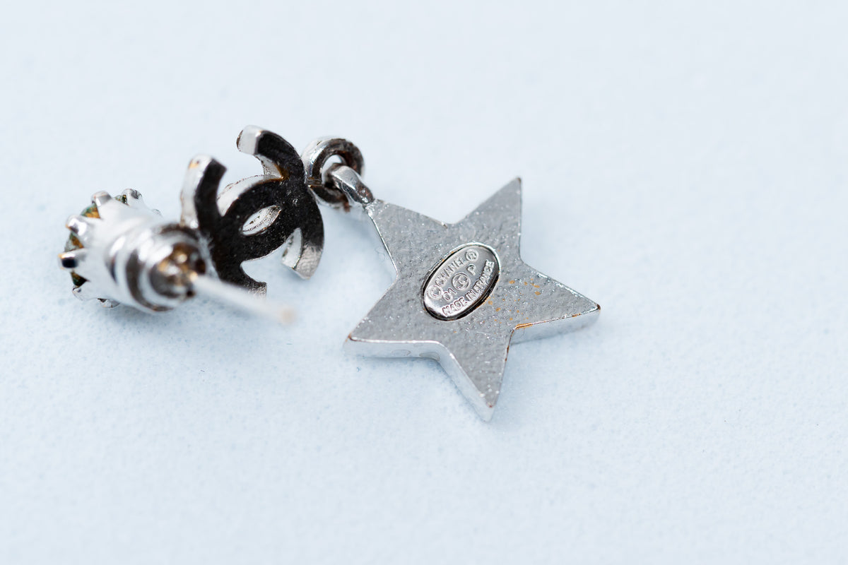 silver tone star drop earrings with crystal embellished logo (stamp)