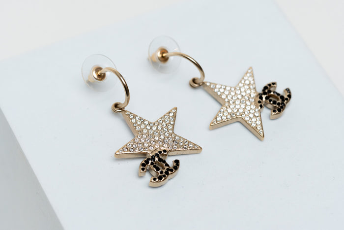 star and logo drop earrings (front)