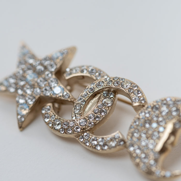 Chanel Gold Star and Moon Brooch with Crystal Embellishments