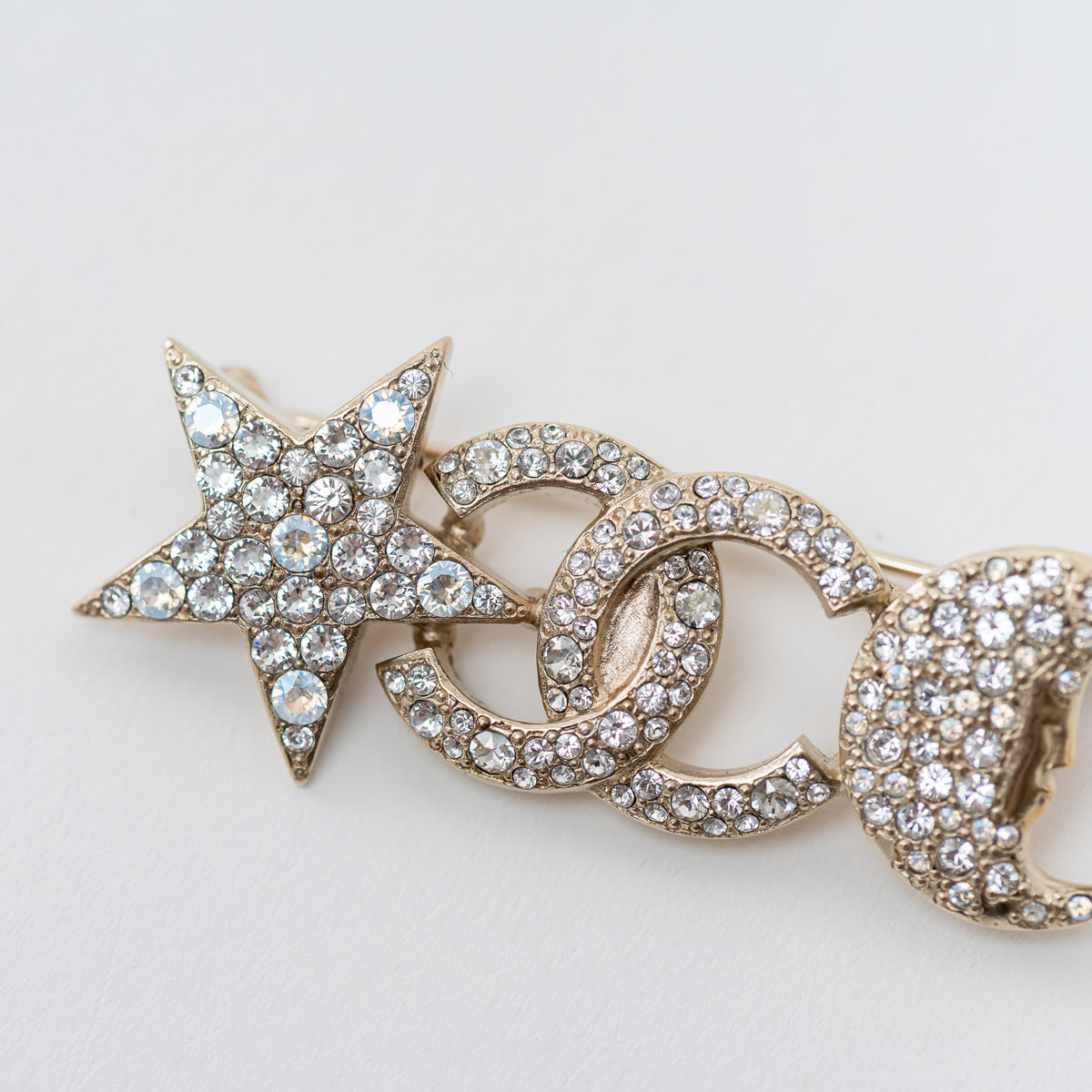 Chanel Gold Star and Moon Brooch with Crystal Embellishments