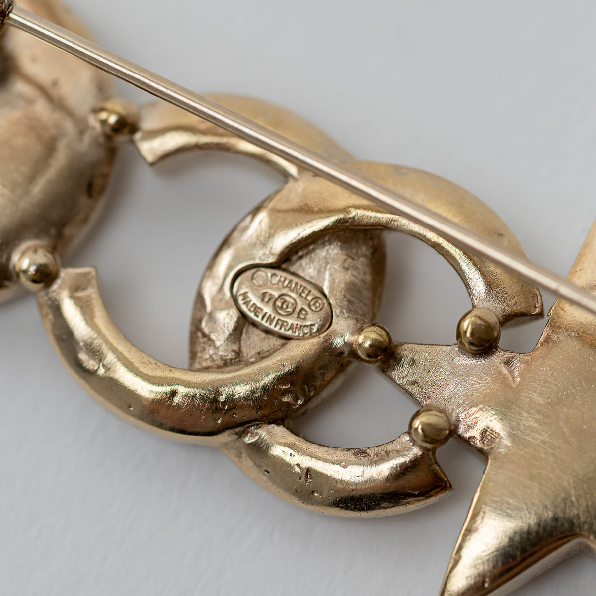 Chanel Gold Star and Moon Brooch with Crystal Embellishments