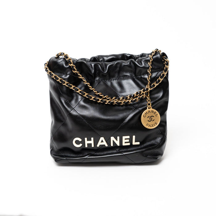 Pre-Loved Chanel™ Black Lambskin Leather Mini 22 Crossbody Bag with White Resin Logo