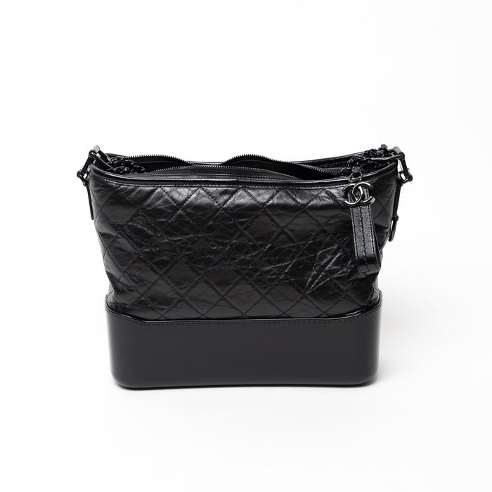 Pre-Loved Chanel™ Black Aged Calfskin Leather Medium Gabrielle Shoulder Bag with Black Hardware