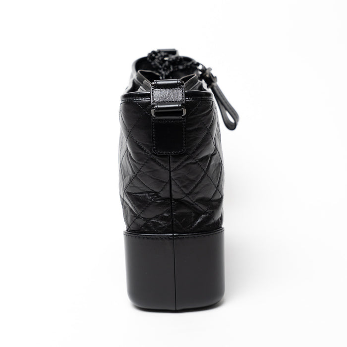 Pre-Loved Chanel™ Black Aged Calfskin Leather Medium Gabrielle Shoulder Bag with Black Hardware