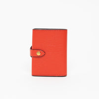 Burberry red grained leather bifold wallet