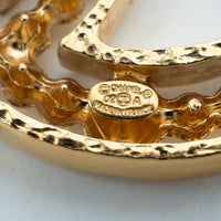 Pre-Loved Chanel™ Gold Tone Crystal Embellished Cut Out Logo Brooch