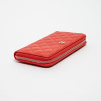 Pre-Loved Chanel™ Coral Pebbled Leather Zip Around Continental Wallet