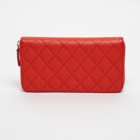 Pre-Loved Chanel™ Coral Pebbled Leather Zip Around Continental Wallet