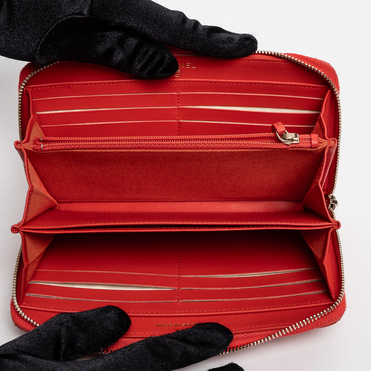 Pre-Loved Chanel™ Coral Pebbled Leather Zip Around Continental Wallet