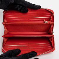 Pre-Loved Chanel™ Coral Pebbled Leather Zip Around Continental Wallet