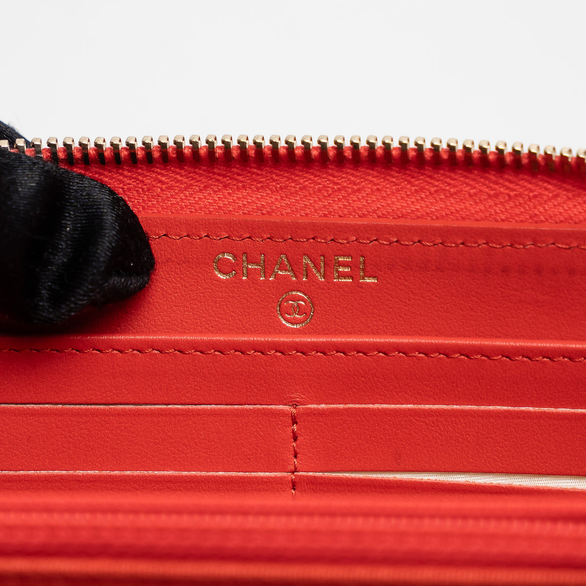 Pre-Loved Chanel™ Coral Pebbled Leather Zip Around Continental Wallet