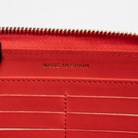 Pre-Loved Chanel™ Coral Pebbled Leather Zip Around Continental Wallet