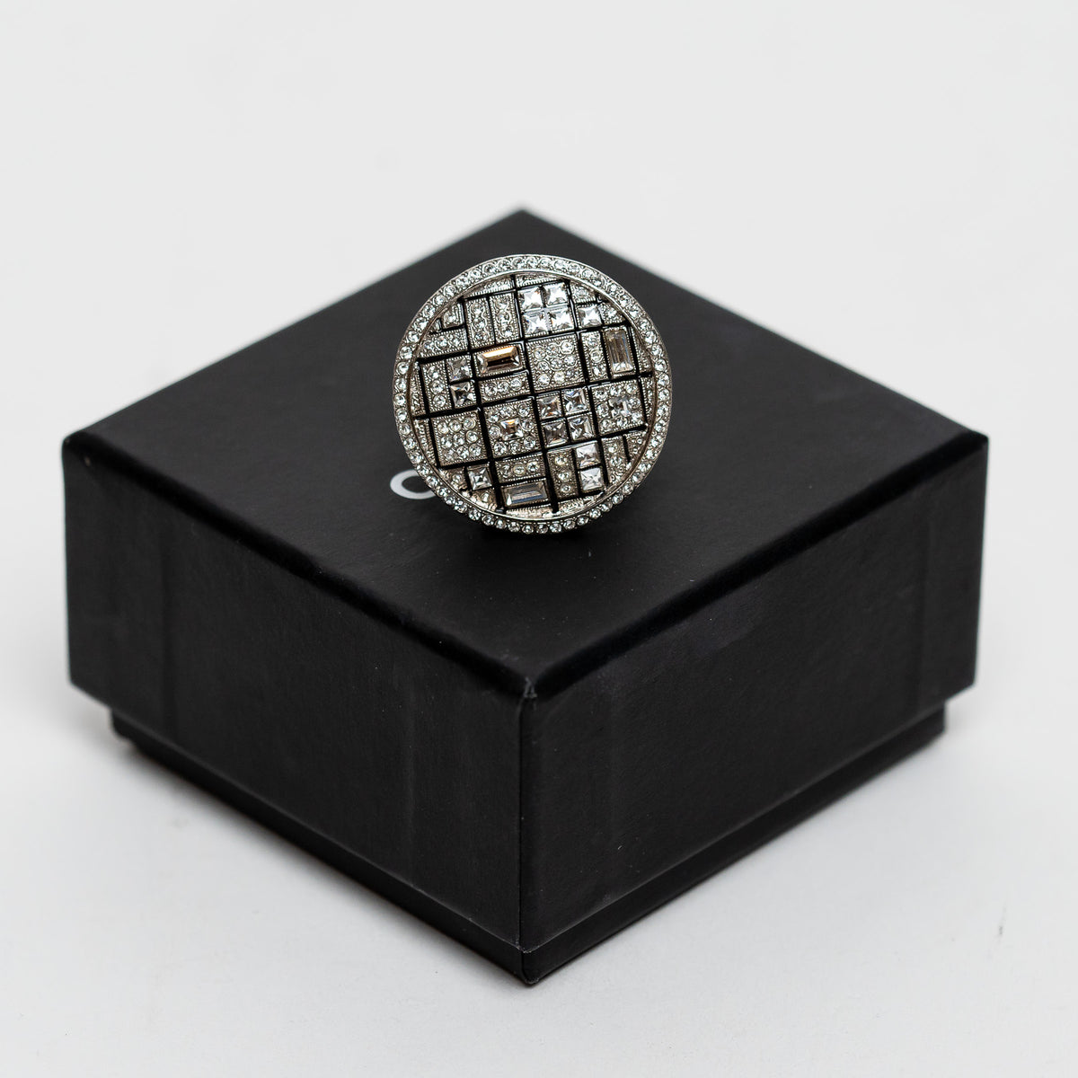 Pre-Loved Chanel™ Silver Tone Ring Embellished with Round, Baguette, and Square Cut Crystals Size 7
