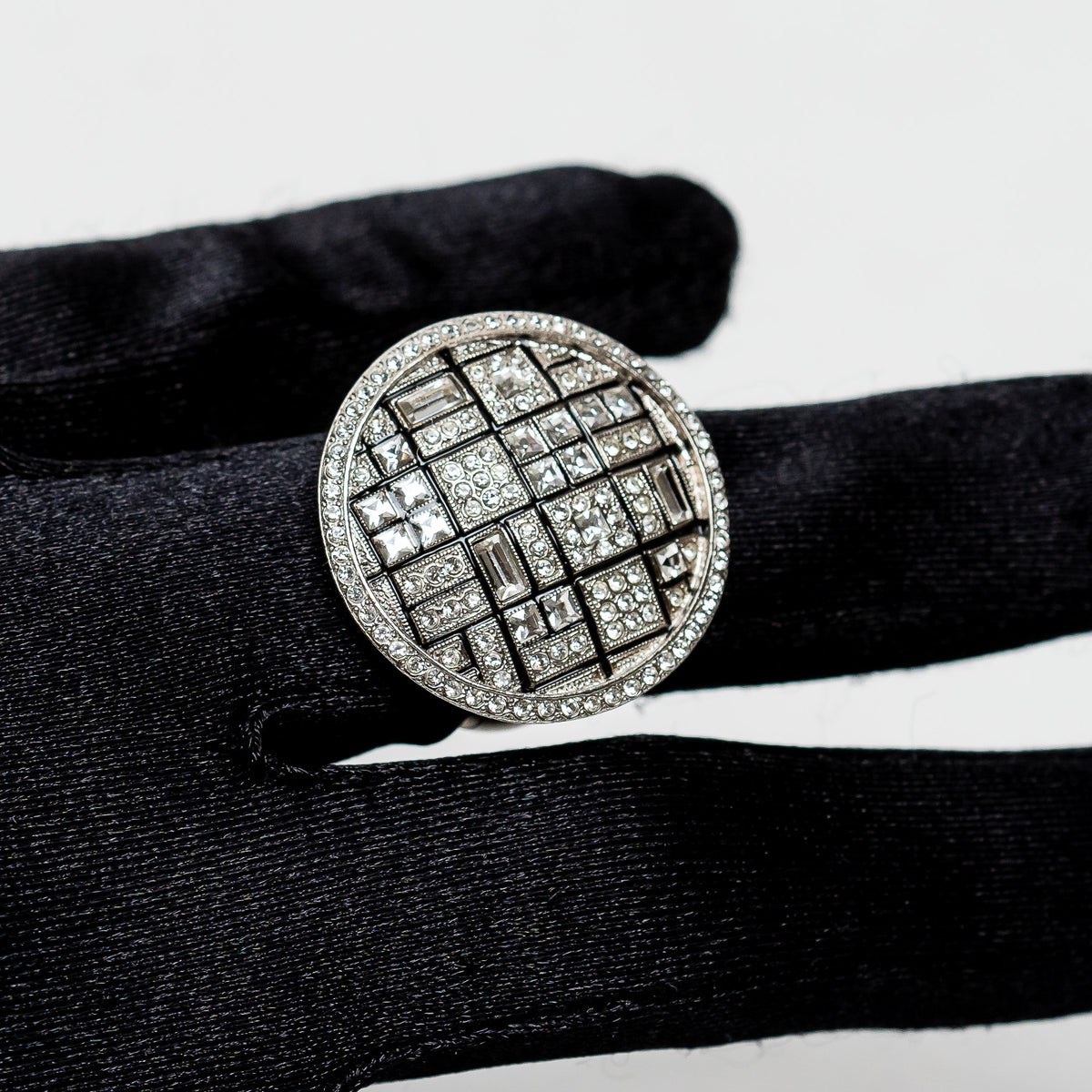 Pre-Loved Chanel™ Silver Tone Ring Embellished with Round, Baguette, and Square Cut Crystals Size 7