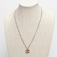 Pre-Loved Chanel™ Gold Tone Logo Pendant Necklace Inset with Clear and Black Crystals