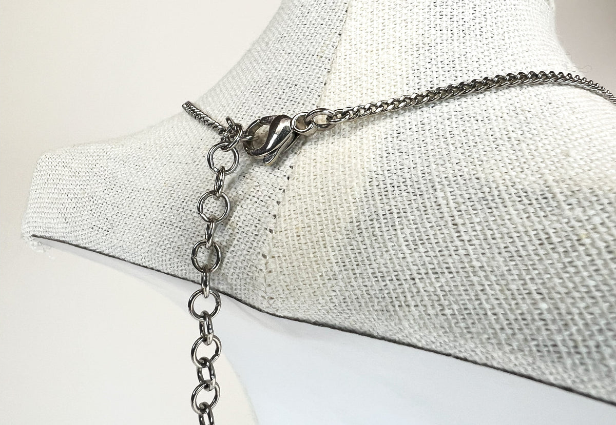 Excellent Pre-Loved Silver Tone Metal with White and Light Yellow Crystal Embellished Floral Pendant Drop Necklace. (clasp)